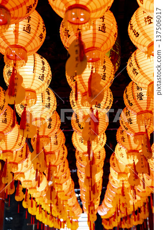 Sacred scenery: temple long corridor arrangement, cultural lanterns that cast light and shadows Sacred scenery: temple long corridor arrangement, cultural lanterns that cast light and shadows 137506017