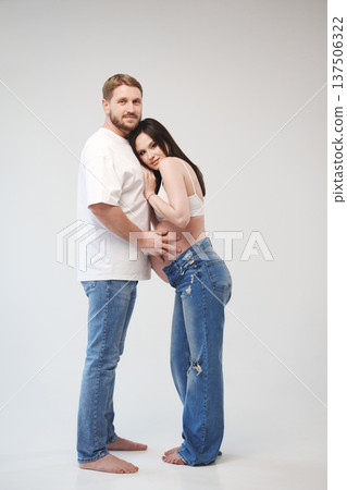 Expecting couple shares tender moment in studio Expecting couple shares tender moment in studio 137506322