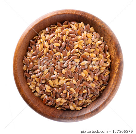 Flax seed mix isolated on white background. Golden and brown linseed or flaxseed in wooden bowl. Clipping path. Top view. 137506579