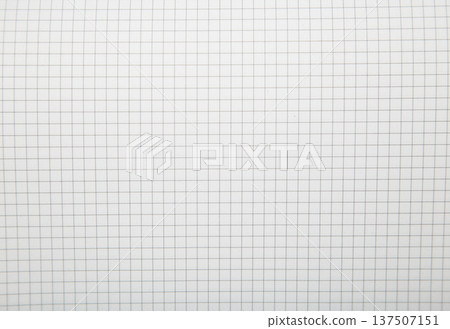 Macro shot of a black metal double-wire spiral binding on white notebook. Macro shot of a black metal double-wire spiral binding on white notebook. 137507151