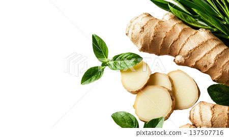 Sliced Galangal Root with Fresh Green Leaves Displayed on a Plain White Background  Galangal is a Tropical Rhizome Commonly Used in Asian Cuisines for its Distinct Flavor and Aroma 137507716