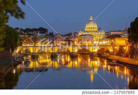 Saint Peter Basilica illuminated above Tiber river in Rome at night Saint Peter Basilica illuminated above Tiber river in Rome at night 137507995