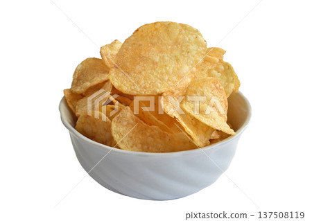 A pile of potato chips on a plate. A pile of potato chips on a plate. 137508119
