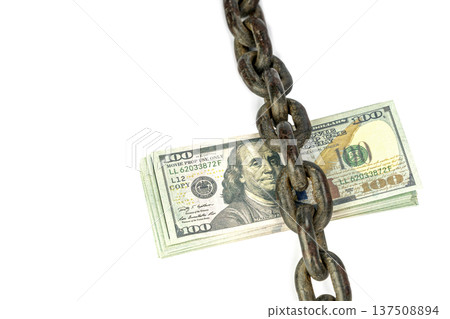Stark Contrast Portraying Money Bound by Chains Implying Financial Restraints and Economic Constraints isolated on white 137508894