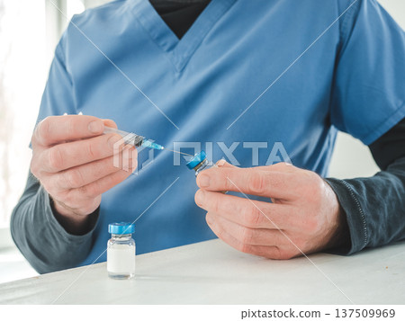 Medical worker in a blue scrubs 137509969