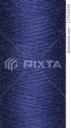 macro texture of a skein of blue sewing thread macro texture of a skein of blue sewing thread 137510539