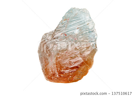 Topaz mineral stone on a isolated white background Topaz mineral stone on a isolated white background 137510617