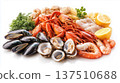 Fresh seafood assortment featuring shrimp, crab, mussels, oysters, and fish, garnished with herbs and lemon slices, showcasing vibrant colors and textures for culinary inspiration 137510688