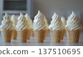 Delicious soft serve ice cream cones arranged in a row, showcasing creamy swirls atop crispy waffle cones, perfect for summer treats and dessert indulgence 137510695