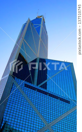 Skyscrapers tower glass buildings. Facade office buildings. High-rise bank building. Hong Kong Skyscrapers tower glass buildings. Facade office buildings. High-rise bank building. Hong Kong 137510745