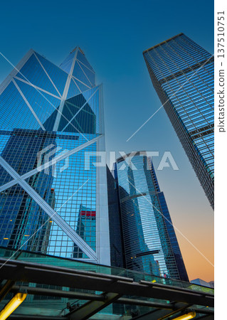 Skyscrapers tower glass buildings. Facade office buildings. High-rise bank building. Hong Kong Skyscrapers tower glass buildings. Facade office buildings. High-rise bank building. Hong Kong 137510751