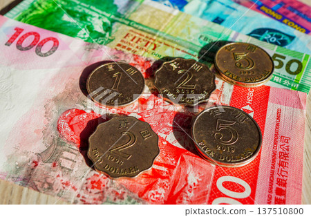 Coins of Hong Kong dollar notes isolated on white background. Hong Kong dollars money cash Coins of Hong Kong dollar notes isolated on white background. Hong Kong dollars money cash 137510800