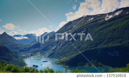 Fjord Geirangerfjord with ferry boat, Norway. 137510919