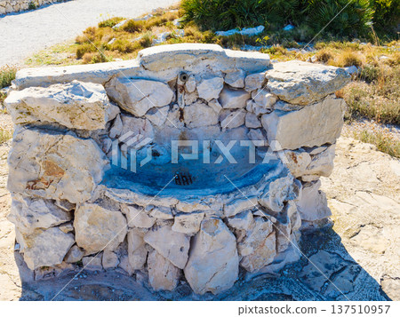 Stone water well in Mediterranean area Stone water well in Mediterranean area 137510957