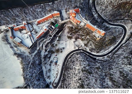 Beautiful old castle - top view from a drone. Winter landscape at sunset. Veveri Castle - City of Brno - Czech Republic - Europe. 137511027