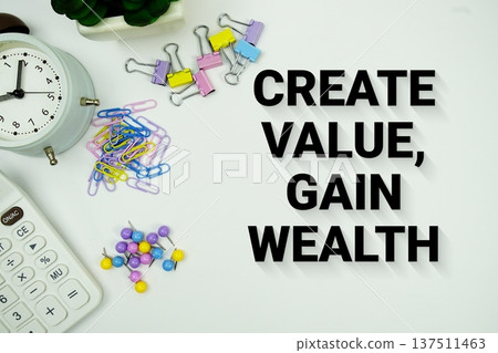 Create Value, Gain Wealth message with calculator, alarm clock and Stationery on white background Create Value, Gain Wealth message with calculator, alarm clock and Stationery on white background 137511463