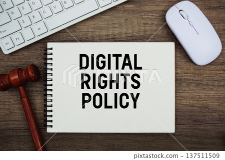Digital Rights Policy text written with gavel, keyboard and optical mouse on wooden background Digital Rights Policy text written with gavel, keyboard and optical mouse on wooden background 137511509