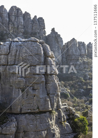 Exploring the rock formations at El Torcal in Spain during daylight hours with a view of the landscape and textures of the rocks 137511666