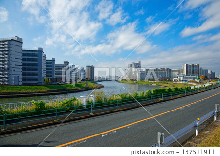 View of the cityscape towards the Sumida River from the Arakawa riverbank View of the cityscape towards the Sumida River from the Arakawa riverbank 137511911