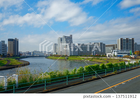 View of the cityscape towards the Sumida River from the Arakawa riverbank View of the cityscape towards the Sumida River from the Arakawa riverbank 137511912