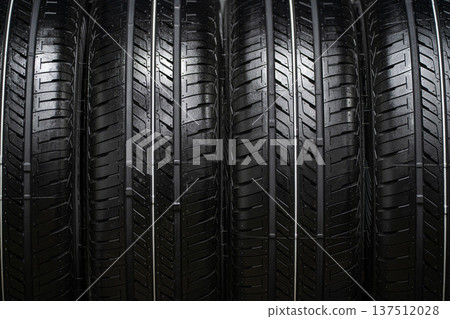 New summer car tires on a rack New summer car tires on a rack 137512028