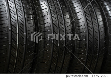 Close-up of a set of summer tires on a car Close-up of a set of summer tires on a car 137512029