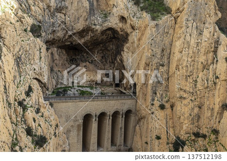Visitors explore Caminito del Rey trail in Spain with stunning views of cliffs and rugged nature Visitors explore Caminito del Rey trail in Spain with stunning views of cliffs and rugged nature 137512198