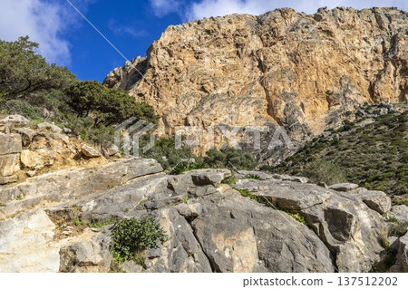 Exploring Caminito del Rey in Spain with rocky cliffs and clear skies Exploring Caminito del Rey in Spain with rocky cliffs and clear skies 137512202