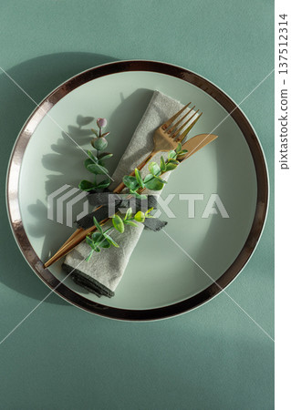 Elegant Table Setting with Napkin and Gold Cutlery. Stylish Easter Spring Arrangement under Sun Light 137512314