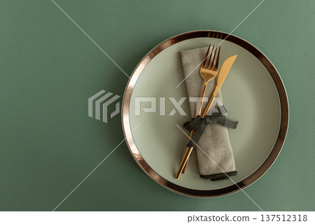 Elegant Table Setting with Napkin and Gold Cutlery. Stylish Easter Spring Arrangement 137512318