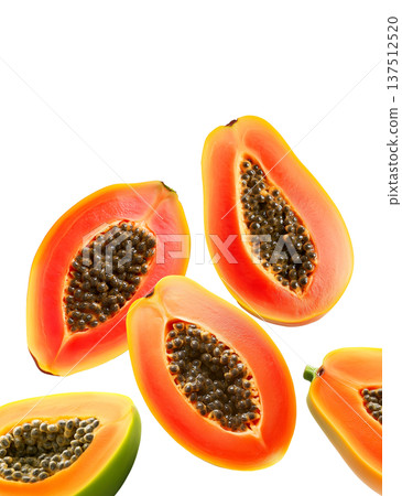 Multiple ripe papaya halves with dark seeds shown isolated on white background, representing a fresh tropical fruit concept Multiple ripe papaya halves with dark seeds shown isolated on white background, representing a fresh tropical fruit concept 137512520