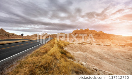 Picturesque road in Badlands National Park at sunset, USA. Picturesque road in Badlands National Park at sunset, USA. 137512750