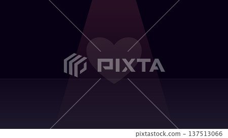 Red heart softly illuminated by spotlight on dark floor with fading gradients creating quiet abstract emotion and dramatic minimalist visual focus under beam. 137513066