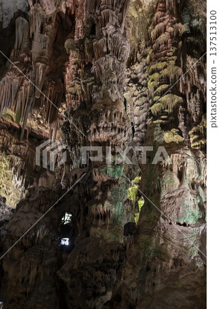 Exploring the unique rock formations inside the caves of Gibraltar during the early afternoon Exploring the unique rock formations inside the caves of Gibraltar during the early afternoon 137513100