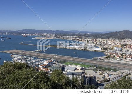 View of Gibraltar port and city from high ground with clear sky during daytime View of Gibraltar port and city from high ground with clear sky during daytime 137513106