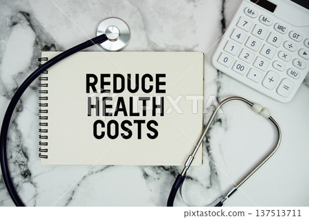 Reduce Health Costs text written on notepad with stethoscope and calculator on marble background Reduce Health Costs text written on notepad with stethoscope and calculator on marble background 137513711