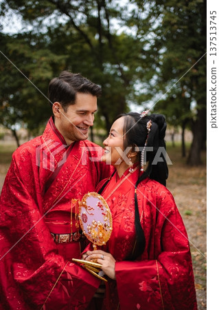 Interracial couple celebrating wedding in traditional Chinese hanfu 137513745
