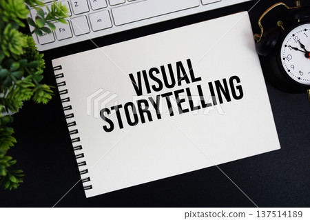 Visual Storytelling text written on notepad with keyboard and alarm clock on black background Visual Storytelling text written on notepad with keyboard and alarm clock on black background 137514189