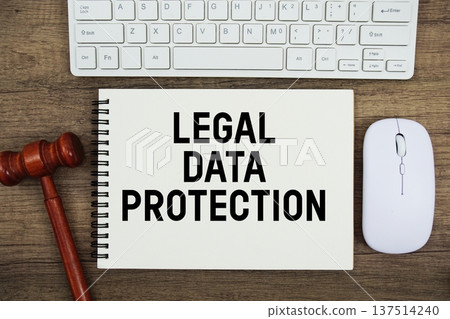 Legal Data Protection text written with gavel, keyboard and optical mouse on wooden background Legal Data Protection text written with gavel, keyboard and optical mouse on wooden background 137514240