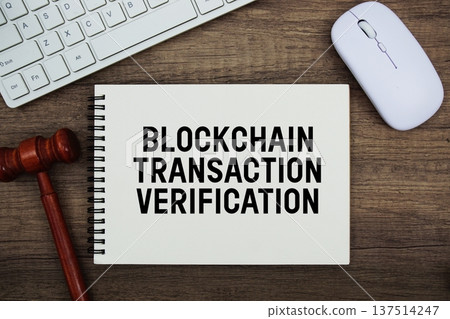 Blockchain Transaction Verification text written with gavel, keyboard and optical mouse on wooden background Blockchain Transaction Verification text written with gavel, keyboard and optical mouse on wooden background 137514247