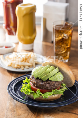 Avocado hamburger, fries and cola 137514694