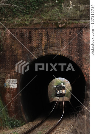 JR Shikoku 1000 series diesel railcar passing through a heavy brick tunnel (Photo taken on February 20, 2026) JR Shikoku 1000 series diesel railcar passing through a heavy brick tunnel (Photo taken on February 20, 2026) 137515784