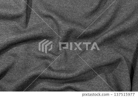 Draped black cotton fabric wrinkles Draped black cotton fabric wrinkles 137515977