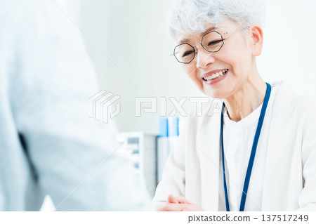 Senior woman receiving consultation 137517249