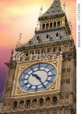 Detailed close view of the Big Ben clock face on the Elizabeth Tower highlighting intricate gothic stonework at the Palace of Westminster in London. Detailed close view of the Big Ben clock face on the Elizabeth Tower highlighting intricate gothic stonework at the Palace of Westminster in London. 137518369