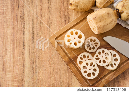 Cut lotus root prepared on a cutting board Cut lotus root prepared on a cutting board 137518406