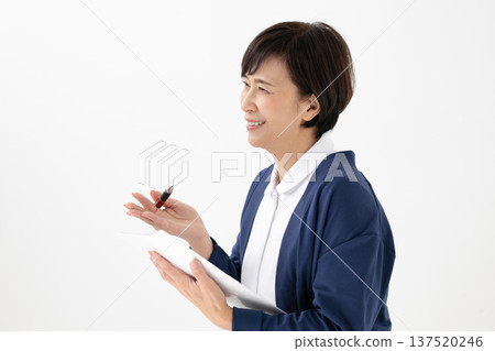 A woman taking an interview A woman taking an interview 137520246