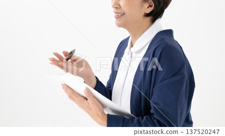 A woman taking an interview A woman taking an interview 137520247