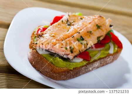 Appetizing sandwich with roasted trout Appetizing sandwich with roasted trout 137521233