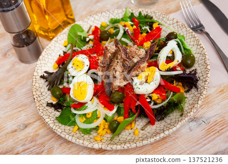 Just cooked fresh lettuce, anchovy, egg salad Just cooked fresh lettuce, anchovy, egg salad 137521236